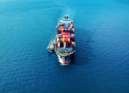 Aerial view of cargo ship with cargo container on sea. Aerial view of cargo ship with cargo container on sea.