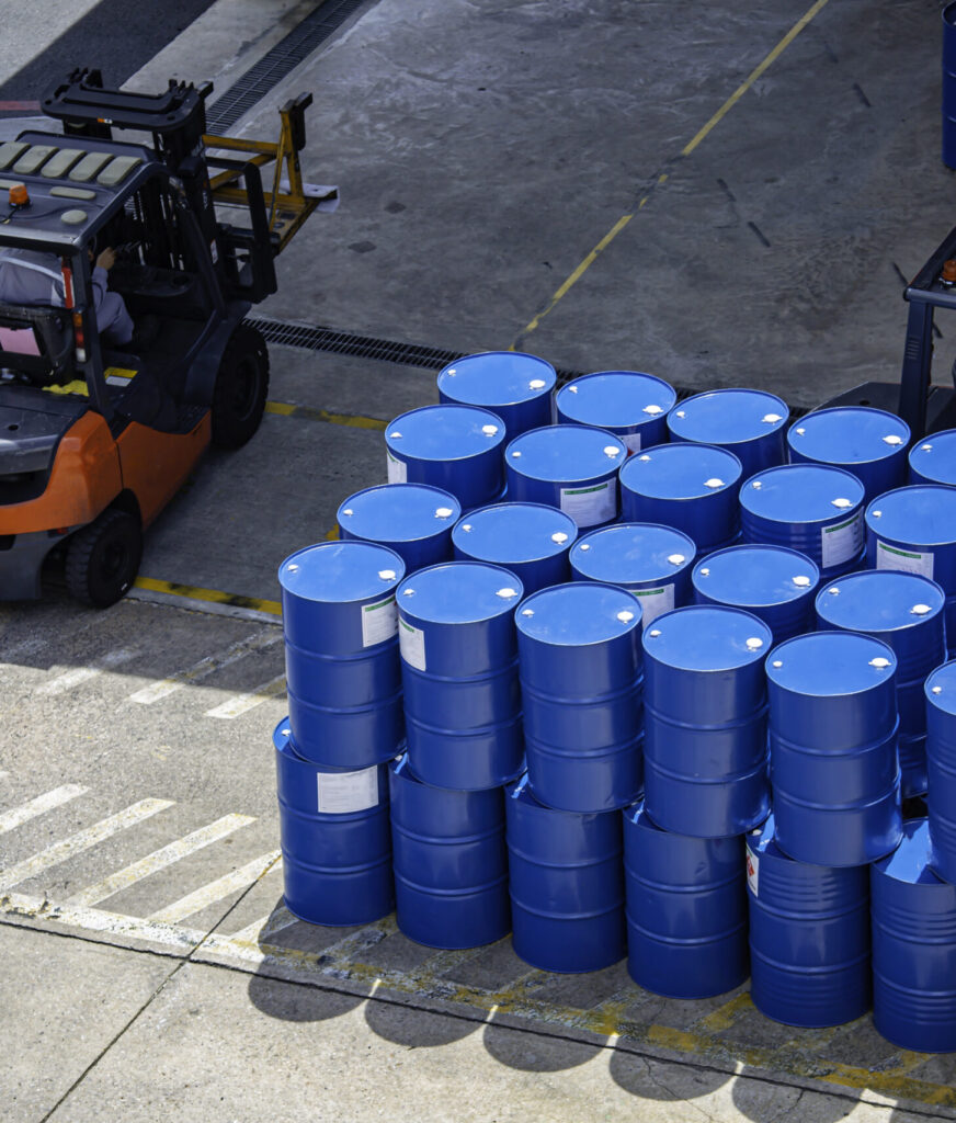 Top view oil barrels forklift truck move for on the transportation worker help arrange.