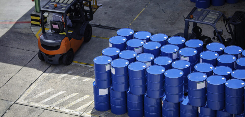 Top view oil barrels forklift truck move for on the transportation worker help arrange.