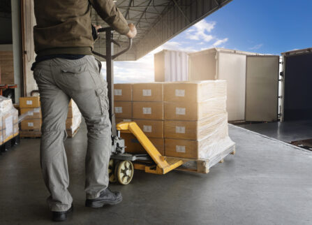 warehouse-worker-loading-package-boxes-into-shipping-container-truck warehouse-worker-loading-package-boxes-into-shipping-container-truck